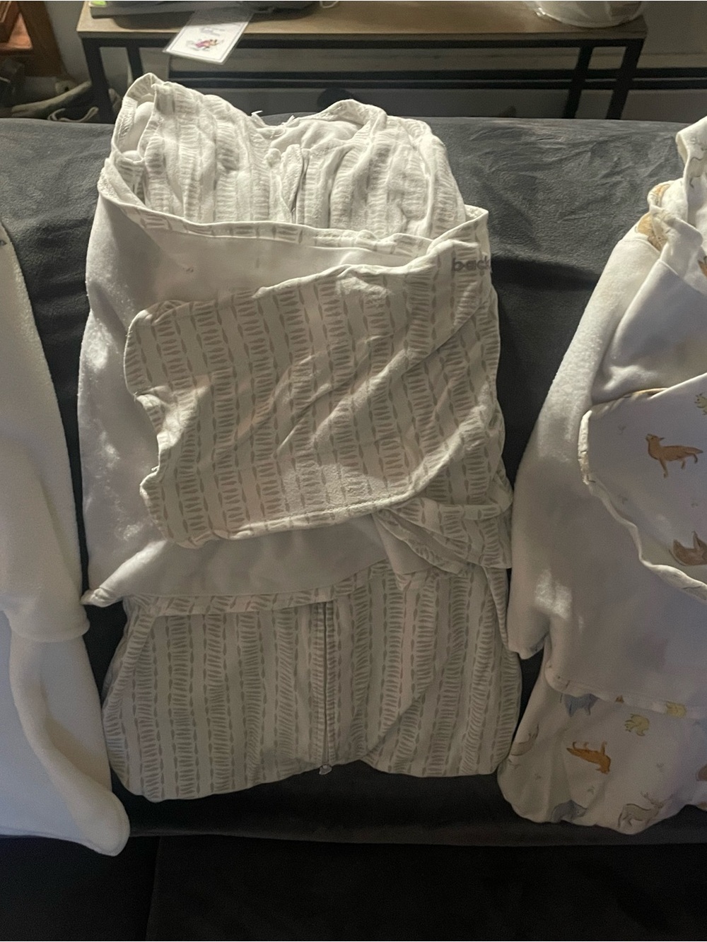 3 halo sleep sack swaddles. Neutral. Striped, animals, and 1fleece.